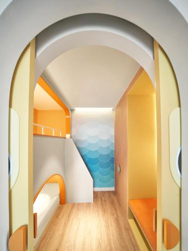 an internal view of a room with an archway at Holiday Inn Resort Ho Tram Beach by IHG in Ho Tram