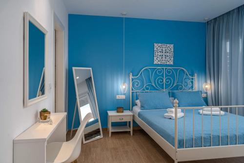 Ένα ή περισσότερα κρεβάτια σε δωμάτιο στο Magnolia Homes Zakynthos