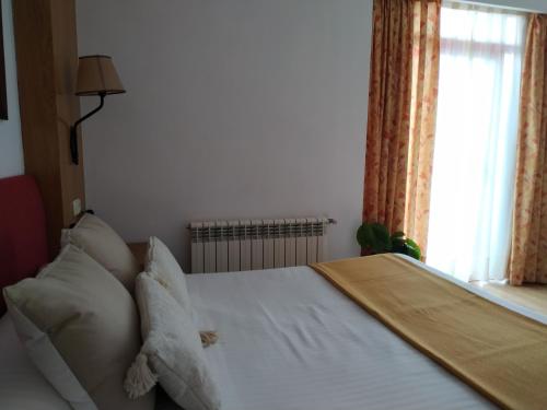 Letto o letti in una camera di Área de Servicio El Cruce