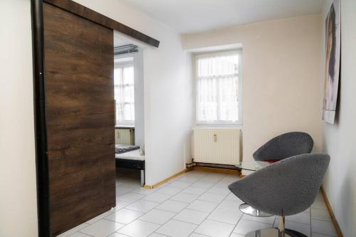 Ruang duduk di 3 Zimmer Wohnung in Bechtolsheim max. 5 Personen
