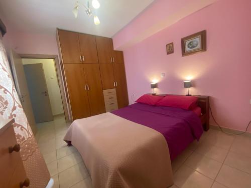Posteľ alebo postele v izbe v ubytovaní Galini Apartment