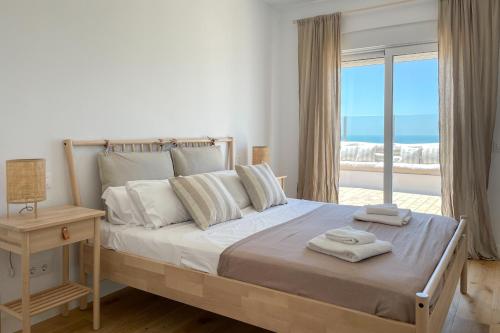 Voodi või voodid majutusasutuse INFINITY Sunny Home by Cadiz4Rentals toas