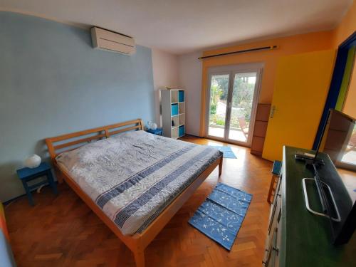 เตียงในห้องที่ Apartment Casetta