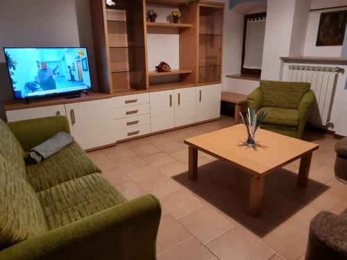 TV a/nebo společenská místnost v ubytování Casa Romeo