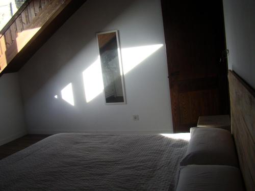 Postel nebo postele na pokoji v ubytování Àtic el Paller de Llau