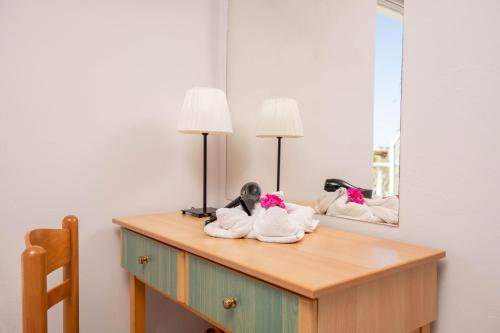Postel nebo postele na pokoji v ubytování En Armonia Hotel