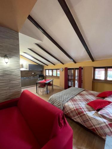 A bed or beds in a room at 'La Buffa', Elegante appartamento a Giaveno by ConfirentHouse