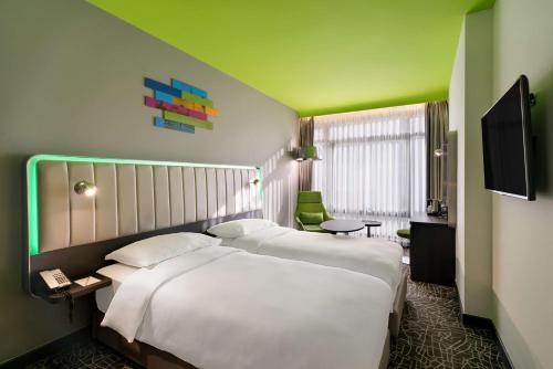 Katil atau katil-katil dalam bilik di Park Inn by Radisson Izmir