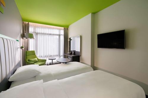 Katil atau katil-katil dalam bilik di Park Inn by Radisson Izmir