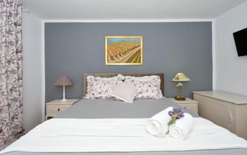 Säng eller sängar i ett rum på Bora bora Apartment