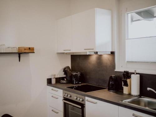 Una cocina o cocineta en Rheinzeit-Weisweil
