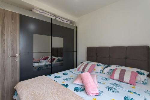 Postel nebo postele na pokoji v ubytování Apartman Nikol