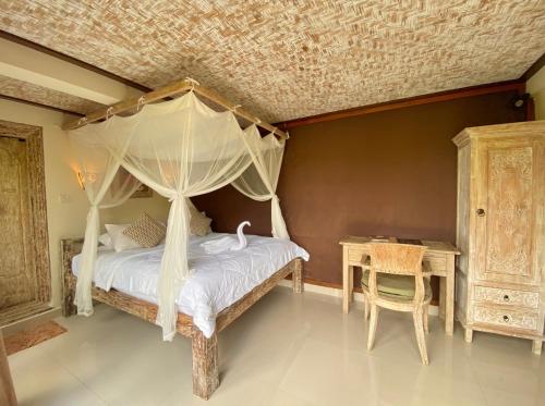 Letto o letti in una camera di Sawah Indah Villa