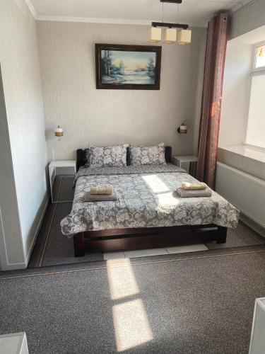 Giường trong phòng chung tại Soroca Motel