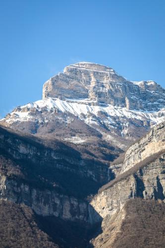 a mountain with snow on top of it at Ibis Styles Crolles Grenoble A41 in Crolles