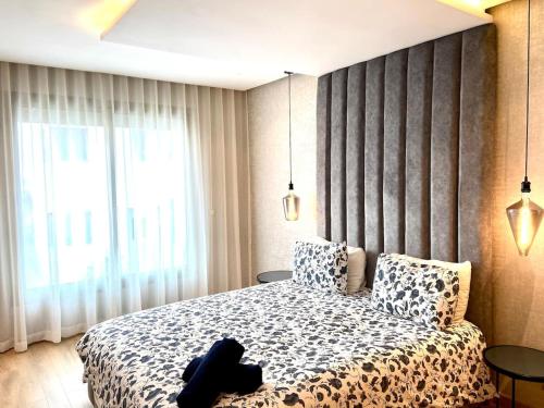 Voodi või voodid majutusasutuse Anfa Living 11 - Classy & Élégant near the Sea toas