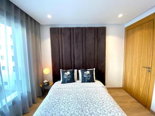 Voodi või voodid majutusasutuse Anfa Living 29-The Gatsby 5 Chic&New Apt near Sea toas