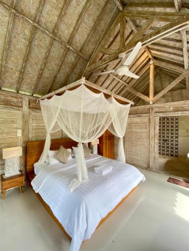 Letto o letti in una camera di Sawah Indah Villa