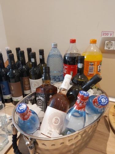a basket full of bottles of wine on a table at Montebello in Predeal