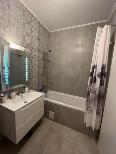 Ванна кімната в Eqinox apartments