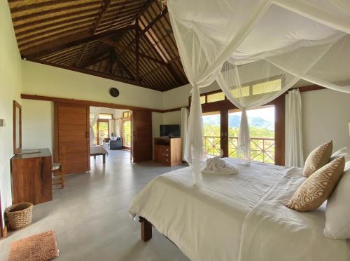 Letto o letti in una camera di Sawah Indah Villa