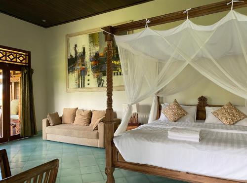 Letto o letti in una camera di Sawah Indah Villa