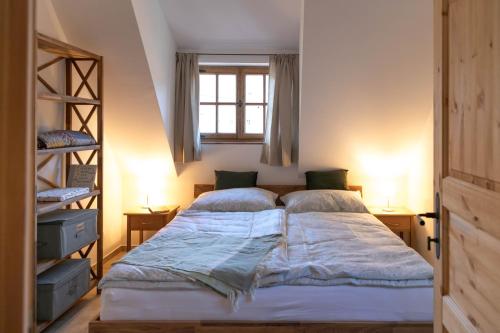 Postel nebo postele na pokoji v ubytování Appartements Adam-Mühle