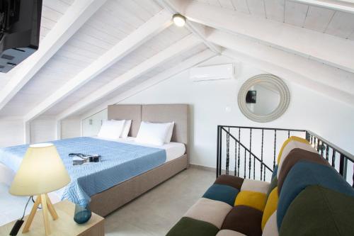 A bed or beds in a room at The Lefkadian collection G and N