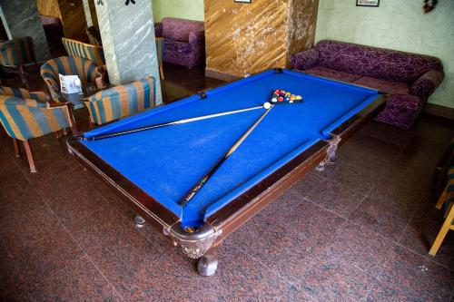 a pool table with balls on top of it at Happy Life Village Dahab in Dahab
