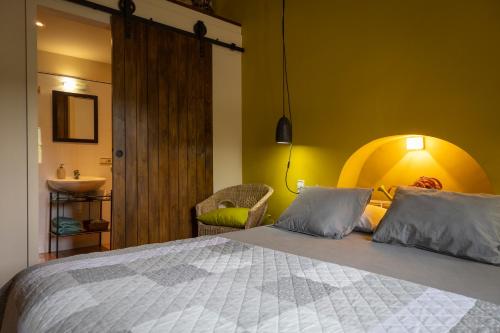 Cama o camas de una habitación en Mas Ombravella