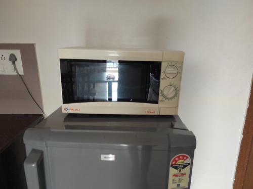 Gallery image of 1BHK AC Service Apartment 110 in Pune