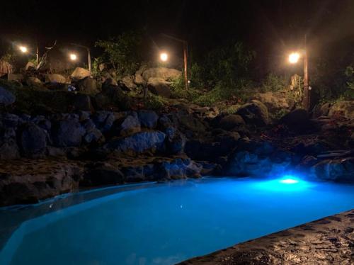 Piscina a FINCA HOTEL CARMONIA DEL BOSQUE o a prop