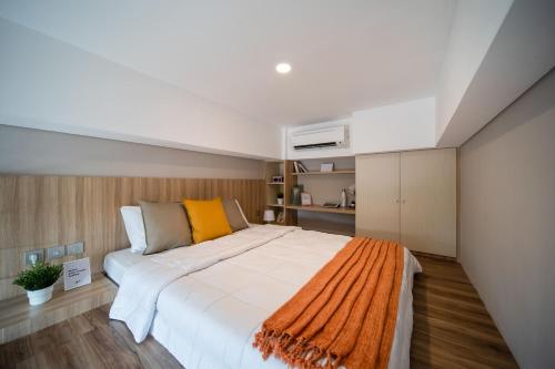 Ένα ή περισσότερα κρεβάτια σε δωμάτιο στο Cove Prima