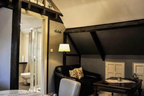Katil atau katil-katil dalam bilik di B&B De Dubbelmolen