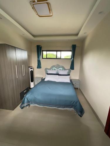 Ένα ή περισσότερα κρεβάτια σε δωμάτιο στο Exclusive Farm Getaway