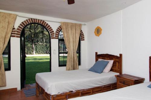 Quinta Taboo tesisinde bir odada yatak veya yataklar