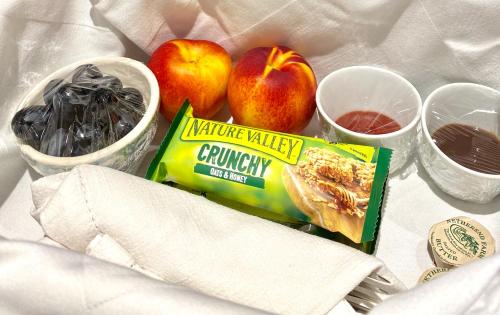 a table with apples and a box of microwave valley crunch cereal at The Loft in the Malt Barn Chipping Campden in Mickleton