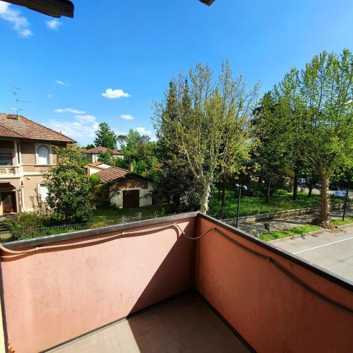 a balcony with a view of a yard at HOTEL PERLA in Massa Lombarda