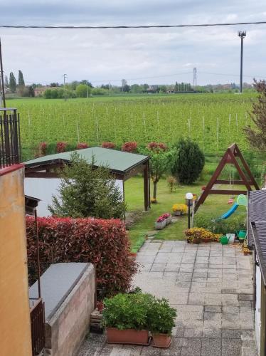 a view of a garden from a roof of a house at I Due Orfici in Cona