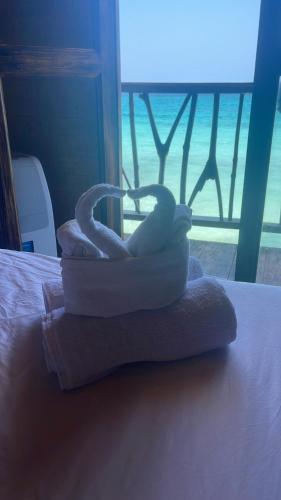 Postel nebo postele na pokoji v ubytování Hotel Prana Beach