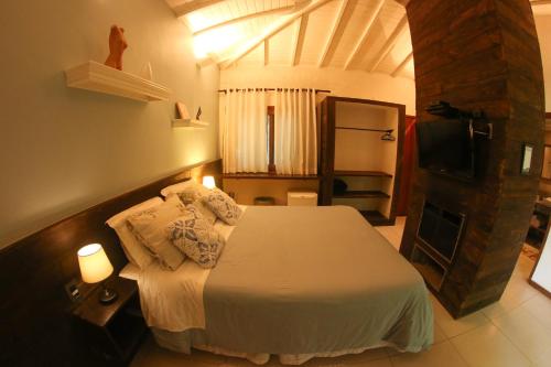 Giường trong phòng chung tại Pousada Encanto da Bocaina - Serra da Bocaina