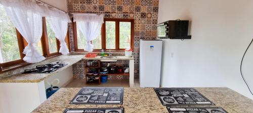 Kuchyň nebo kuchyňský kout v ubytování Chalés Pura Vida