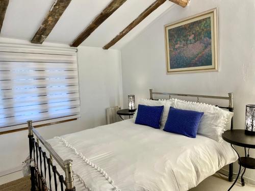 Postel nebo postele na pokoji v ubytování Casa Árbol