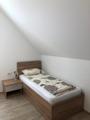 Postel nebo postele na pokoji v ubytování Apartmaji Kramar Rateče