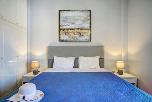 Ένα ή περισσότερα κρεβάτια σε δωμάτιο στο Azure Mare Studios