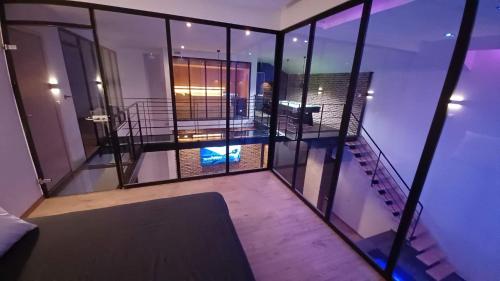 a view of a balcony of a building at loft d architecte spa sauna billard 12 places ultra contemporain in Ferrière-la-Grande