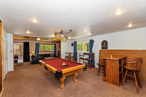 a living room with a pool table in it at 049 - Mountain Time in Big Bear Lake