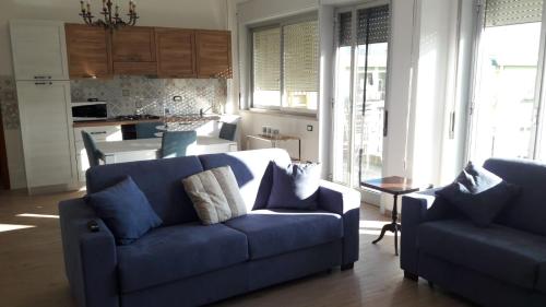 Posedenie v ubytovaní Pecciolo Port Apartaments