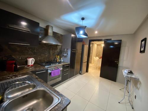Kuchyň nebo kuchyňský kout v ubytování Sweet Jacob's Appartment Gueliz City Center