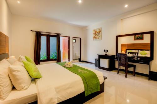 Postel nebo postele na pokoji v ubytování Gracia Bali Villas & Apartment Managed by Manara